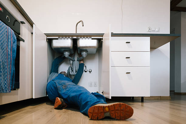 Professional Drain Cleaning technician working in Forest Hills, MI